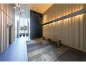 Residential hallway with contemporary decor and a wooden bench at 145 15Th Ne St # 401, Atlanta, GA 30309