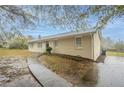 Charming ranch home with landscaped yard and walkway at 1496 E Highpoint Dr, Douglasville, GA 30134