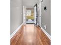 Hardwood floors and neutral-toned walls in entryway at 20 Madison Ct, Covington, GA 30016