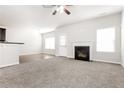 Spacious living room with fireplace and hardwood floors at 7843 Shertall St, Fairburn, GA 30213
