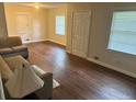 Living room with hardwood floors and neutral color palette at 2962 Mcafee Rd, Decatur, GA 30032
