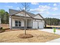 Charming new Ranch home with two-car garage and landscaped lawn at 188 Vinca Nw Cir, Kennesaw, GA 30144