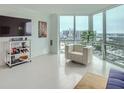 Modern living room with city views and hardwood floors at 2870 Pharr Court S Nw # 2703, Atlanta, GA 30305