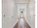 Bright foyer with hardwood floors and neutral walls at 3445 Summerdale Walk, Cumming, GA 30028