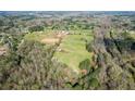 Aerial view of West Creek Stables and surrounding land at 2431 Perkerson Mill Rd, Austell, GA 30106