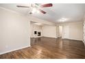 Spacious living room with hardwood floors and fireplace at 3661 Collins Dr, Douglasville, GA 30135