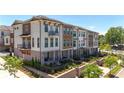 Upscale townhomes showcasing architectural details at 358 Olmstead Way # 25, Alpharetta, GA 30022