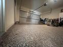 Attached garage with epoxy coated flooring at 602 Lofty Sw Ln, Atlanta, GA 30331