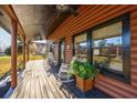 Relaxing front porch with rocking chairs, offering a cozy outdoor space at 923 Pine Cir, Woodstock, GA 30189