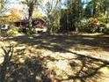 Spacious backyard with mature trees and private setting at 2466 Stone Sw Dr, Lilburn, GA 30047