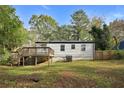 Home with a deck and a large backyard at 1642 Cecilia Se Dr, Atlanta, GA 30316