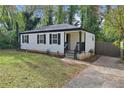 Ranch style home with a driveway and a fenced backyard at 1642 Cecilia Se Dr, Atlanta, GA 30316