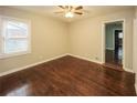 Bright bedroom with hardwood floors and ample natural light at 5370 Feldwood Rd, Atlanta, GA 30349