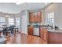 Eat-in kitchen with stainless steel appliances and wood cabinets at 2555 Flat Shoals Rd # 1801, Atlanta, GA 30349