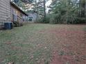 Spacious backyard with mature trees at 4414 Blackbirch Ln, Decatur, GA 30034
