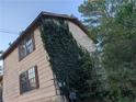 Exterior view showcasing a side of the house with ivy at 4414 Blackbirch Ln, Decatur, GA 30034