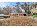 Brick ranch house on a tree-lined street at 2052 Brannen Se Rd, Atlanta, GA 30316