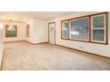 Spacious living room with neutral carpeting at 2052 Brannen Se Rd, Atlanta, GA 30316