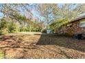 Large backyard with spacious grassy area at 936 Green Valley Sw Rd, Mableton, GA 30126