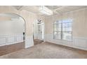 Bright dining room features crown molding and hardwood floors at 5619 Sawgrass Cir, Stonecrest, GA 30038