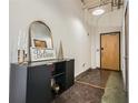 Entryway with modern console table and mirror at 426 Marietta Nw St # 410, Atlanta, GA 30313