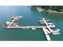 Aerial view of community boat docks with many boats at 3200 Rim Cove Dr # 186, Cumming, GA 30041