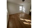 Bright bedroom featuring light wood-look flooring at 1777 Cahoon Sw St, Atlanta, GA 30310