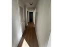 Light and airy hallway with light wood-look flooring at 1777 Cahoon Sw St, Atlanta, GA 30310