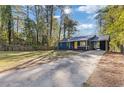 Newly renovated blue house with a spacious yard at 1085 Hendon Se Rd, Atlanta, GA 30354