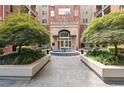 Inviting courtyard with fountain and lush landscaping at 50 Biscayne Nw Dr # 6117, Atlanta, GA 30309