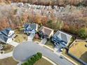 Community view showcasing houses and trees in autumn at 904 Berry Ct, Canton, GA 30114