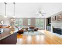 Spacious living room with hardwood floors, fireplace, and access to balcony at 2252 Edgartown Se Ln # 2, Smyrna, GA 30080