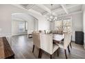 Formal dining room with hardwood floors and a large wooden table at 9104 Hanover St, Lithia Springs, GA 30122