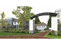 Wills Overlook entrance with brick pillars, signage, and a paved driveway at 531 S Main St # 410, Alpharetta, GA 30009