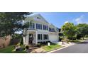 Two-story house with gray siding, dark shutters, and a stone walkway at 3919 Cash Lndg, Marietta, GA 30066