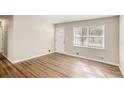Bright living room with hardwood floors and large window at 763 Tara Se Cir, Atlanta, GA 30354
