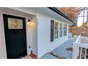 Black front door with a glass panel and white trim at 265 Line Sw Rd, Atlanta, GA 30331