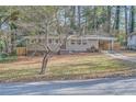 Ranch home with mature trees and a spacious yard at 1374 Margarette Dr, Decatur, GA 30035