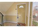 Front door entry with tile floor and welcome mat at 2825 Northeast Ne Expy # E2, Atlanta, GA 30345