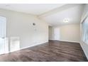 Bright living room with vinyl flooring and neutral walls at 4404 Mercer Rd, Decatur, GA 30035