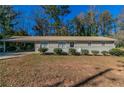 Newly painted ranch home with carport at 8775 Lee Rd, Lithia Springs, GA 30122