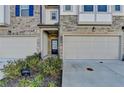 Townhome entry with neutral paint, wood-look floors, and private exterior door at 1124 Lossie Ln, Grayson, GA 30017