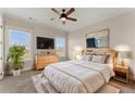 Bright bedroom with large windows, a dresser, and a king-size bed at 351 Washington Ne Ave # 302, Marietta, GA 30060