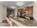 Modern kitchen with granite countertops and stainless steel appliances at 351 Washington Ne Ave # 302, Marietta, GA 30060