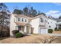 Two-story house with a two-car garage and covered entryway at 2907 Edgewater St, Atlanta, GA 30331