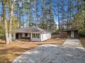 Ranch house with large driveway and detached shed at 4760 Hillside Dr, Acworth, GA 30101