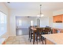 Kitchen with island, granite countertops, and breakfast bar at 6980 Talkeetna Sw Ct, Atlanta, GA 30331