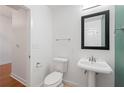 Clean bathroom with pedestal sink and toilet at 3300 Windy Ridge Se Pkwy # 1113, Atlanta, GA 30339
