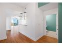 Hardwood floor hallway with view into living area and bathroom at 3300 Windy Ridge Se Pkwy # 1113, Atlanta, GA 30339