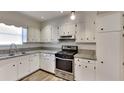 Kitchen with granite countertops and stainless steel appliances at 2193 Hampton Se Trl, Conyers, GA 30013